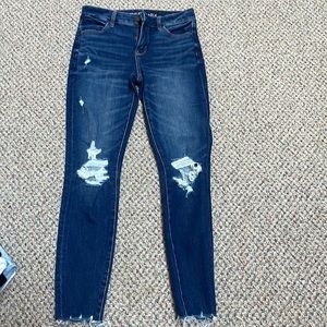 Dark blue ripped jeans